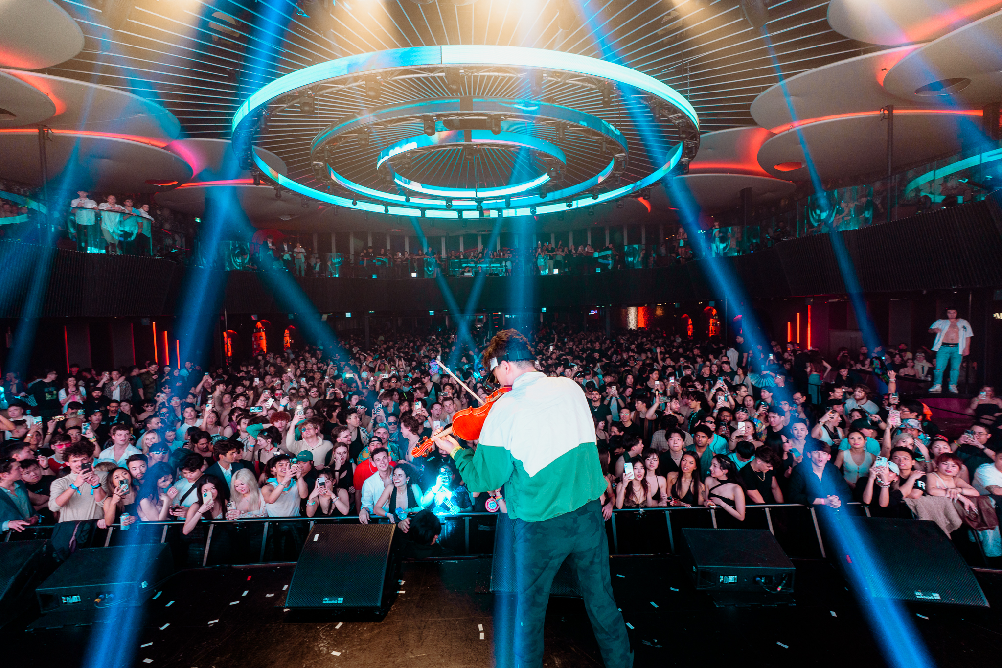 ZHUKEEPER performing with electric violin